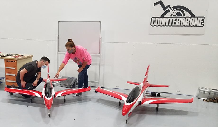 Students working on high speed drone assembly and test